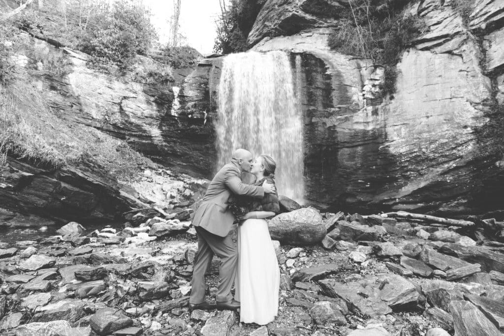 A Bride and Groom in front of Looking Glass Falls on the Blue Ridge Parkway