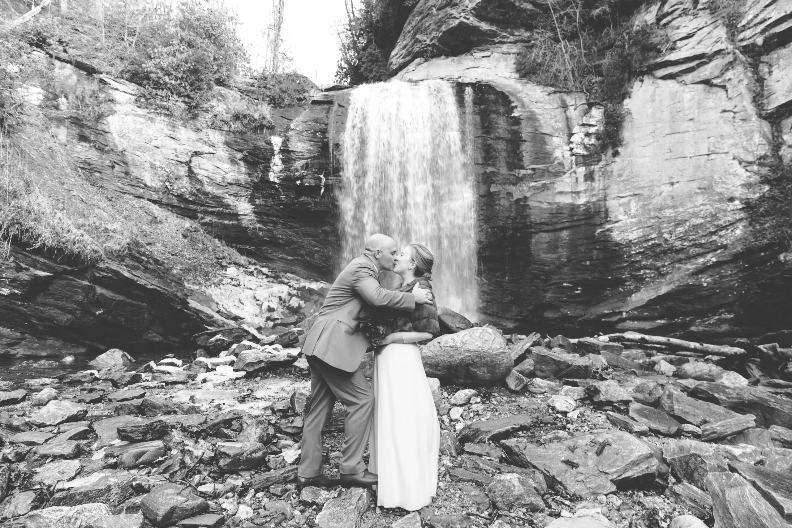 A Bride and Groom in front of Looking Glass Falls on the Blue Ridge Parkway